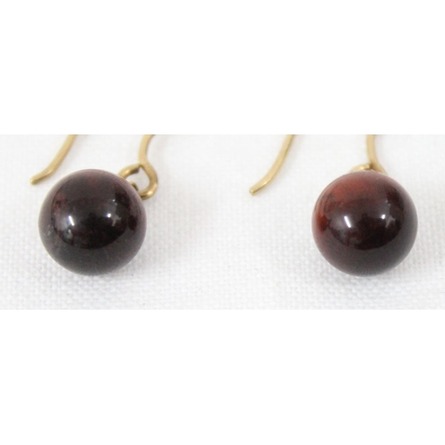 1102 - A pair of 9ct gold and Tiger's Eye drop earrings, marked 9k but XRF confirmed