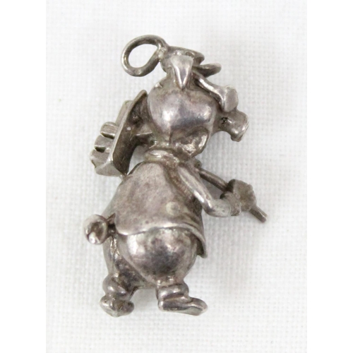 1104 - A small silver pendant or charm formed as a pig hod carrier