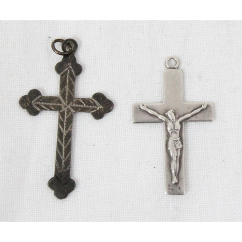 1106 - 4 assorted silver crucifix pendants