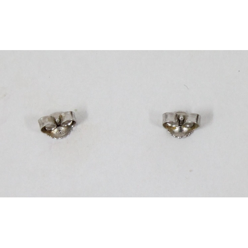 1122 - A pair of 9ct white gold and pearl earrings in original box