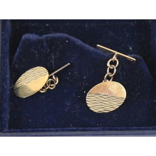 1126 - A pair of 9ct gold cufflinks, a 9ct gold tie pin with gold plated back and a silver cufflink and tie... 