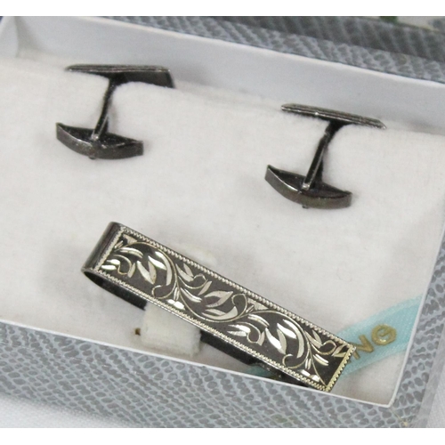 1126 - A pair of 9ct gold cufflinks, a 9ct gold tie pin with gold plated back and a silver cufflink and tie... 