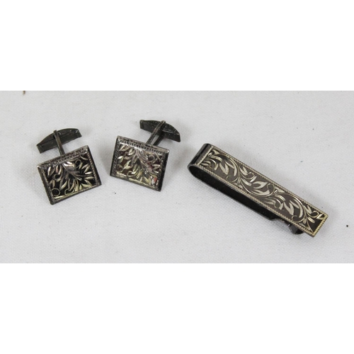 1126 - A pair of 9ct gold cufflinks, a 9ct gold tie pin with gold plated back and a silver cufflink and tie... 