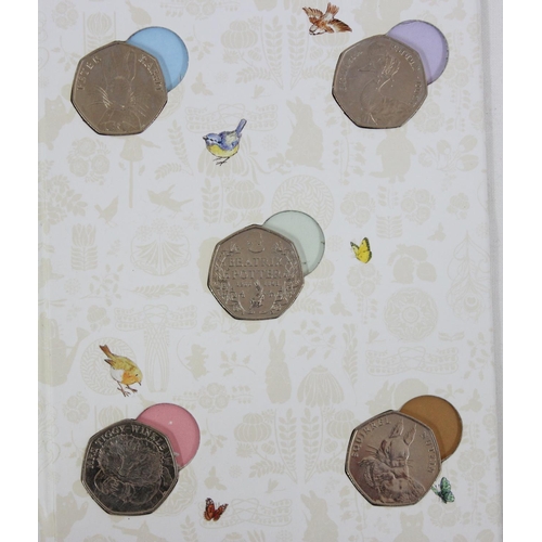 1249 - 3 Royal Mint 150 year of Beatrix Potter 50p collectors folder, CA50B15, each containing 5 coins, one... 