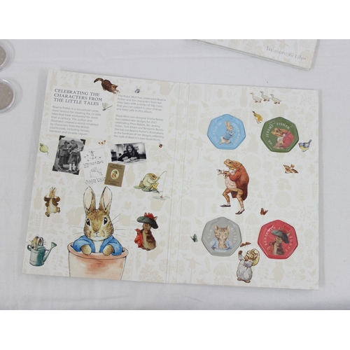 1251 - Royal Mint 2017 Beatrix Potter collectors folder and 4 coins, CA50BP17, an empty folder and various ... 