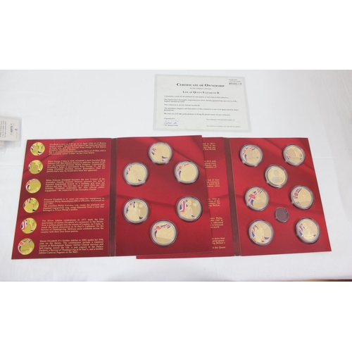 1271 - 2 folders of Queen Elizabeth II commemorative gold plated on copper medallions with paperwork