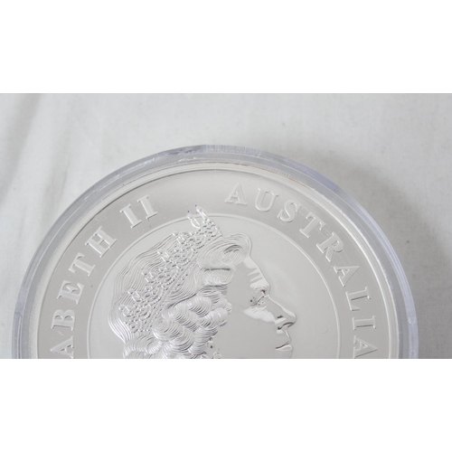 1297 - A rare 2010 Australian Kookaburra 1kg 999 fine silver $30 coin, proof finish, approx 10cm in diamete... 