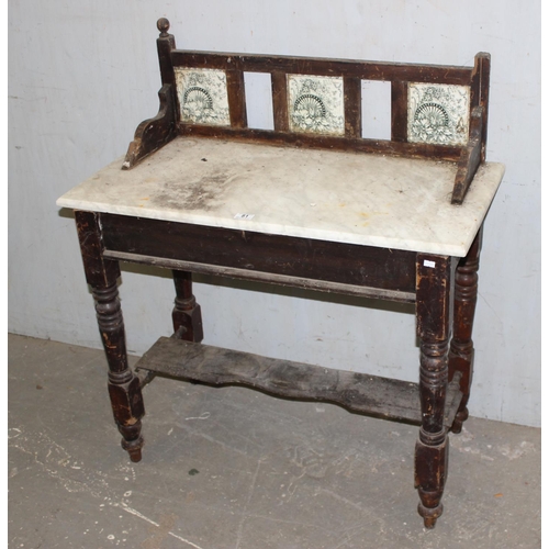 81 - A 19th century stained pine washstand with marble top and tile back, approx 92cm wide