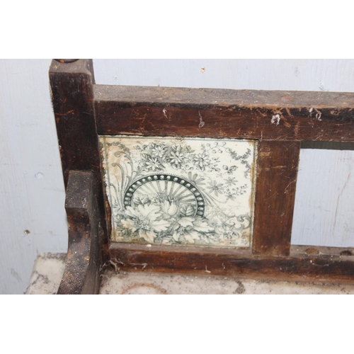 81 - A 19th century stained pine washstand with marble top and tile back, approx 92cm wide