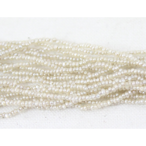 1147 - An antique 9 strand seed pearl necklace, believed to be Georgian, with 18ct gold mounted clasp set w... 