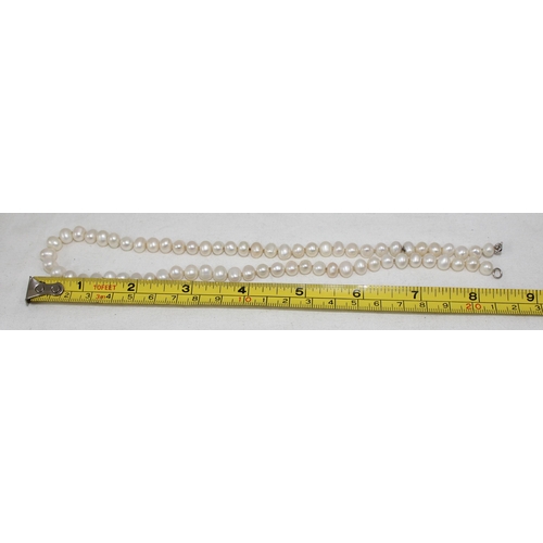 1148 - A modern pearl necklace with 925 silver clasp, approx 45cm long, the largest pearl approx 8mm in dia... 