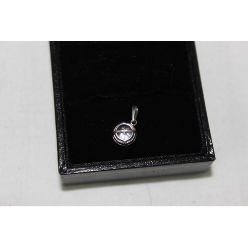 1149 - 9ct white gold mounted solitaire white stone pendant, approx 0.71g gross