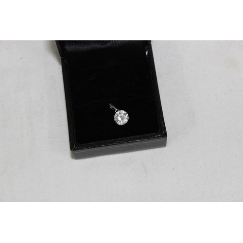 1149 - 9ct white gold mounted solitaire white stone pendant, approx 0.71g gross