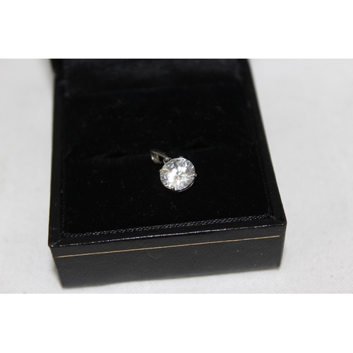 1149 - 9ct white gold mounted solitaire white stone pendant, approx 0.71g gross