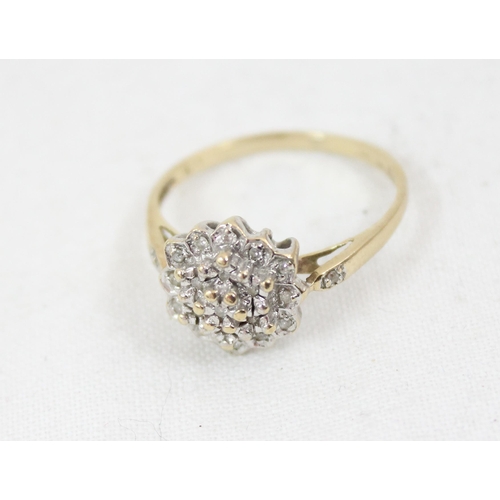 1152 - A 9ct gold and floral set diamond cluster ring, approx size T, approx 2.64g gross