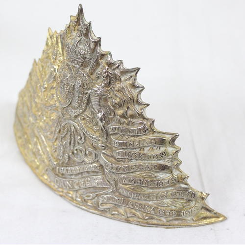 1437 - An early 20th century Kings Crown Royal Lancers helmet plate, post 1902, approx 19cm wide