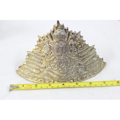 1437 - An early 20th century Kings Crown Royal Lancers helmet plate, post 1902, approx 19cm wide