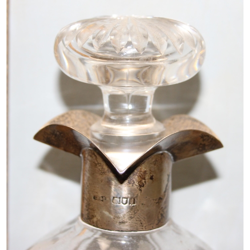 1058 - An antique silver mounted and cut glass decanter, marked for London 1904 by Thomas Webb & Sons, appr... 