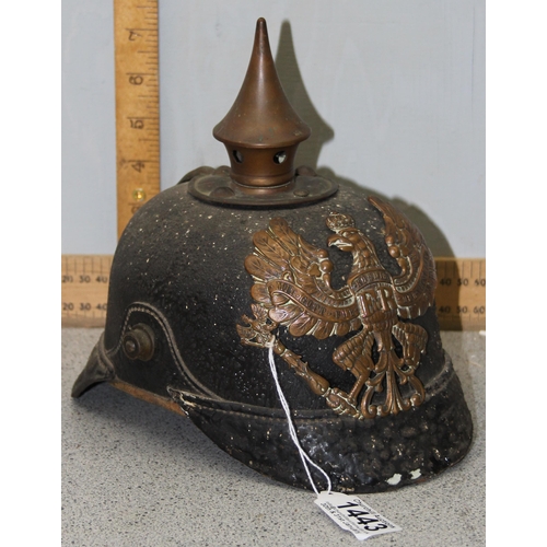 1443 - An original WW1 period German Pickelhaube helmet on leather and brass construction with liner and ea... 