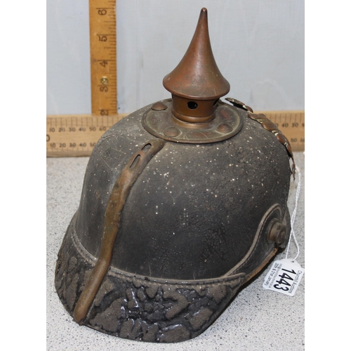 1443 - An original WW1 period German Pickelhaube helmet on leather and brass construction with liner and ea... 