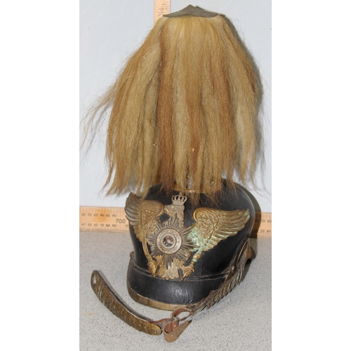 1444 - A late 19th or early 20th century Prussian Pickelhaube helmet with hair crest, the front adorned wit... 