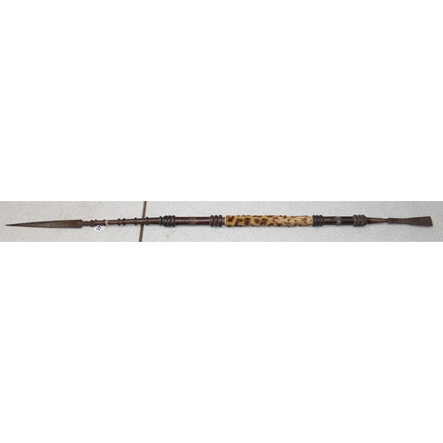 1445 - An unusual African tribal leather clad wooden spear with iron ends and leopard skin handle, approx 1... 