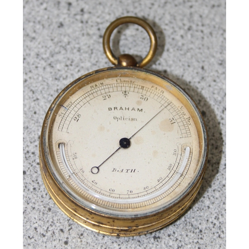 720 - An antique Braham of Bath pocket barometer & another compensated pocket barometer (2)