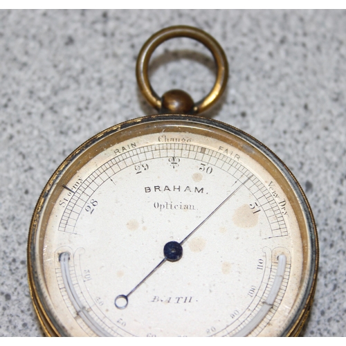 720 - An antique Braham of Bath pocket barometer & another compensated pocket barometer (2)