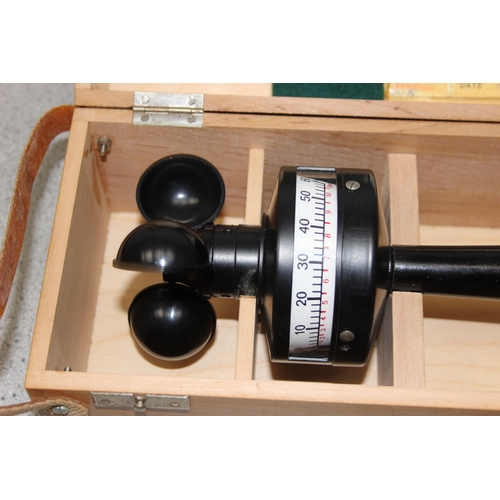 721 - A Negretti & Zambra cup anemometer in wooden case