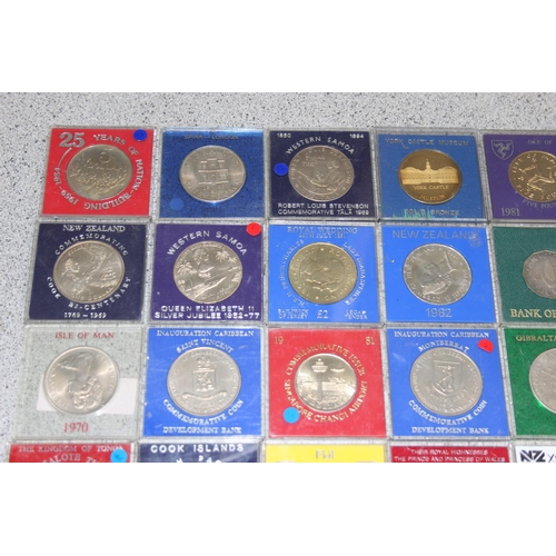 1189 - 36 assorted cased commemorative coins and medallions, various world coins, mainly British colonial