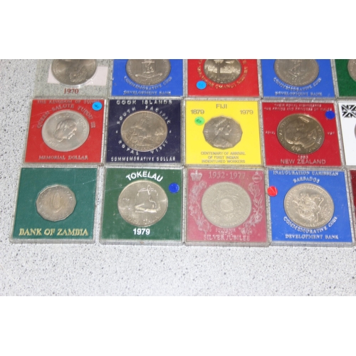 1189 - 36 assorted cased commemorative coins and medallions, various world coins, mainly British colonial