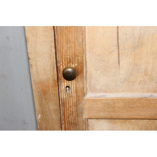 129 - A Victorian pine hall cupboard with shelves, approx 153cm tall by 77cm wide