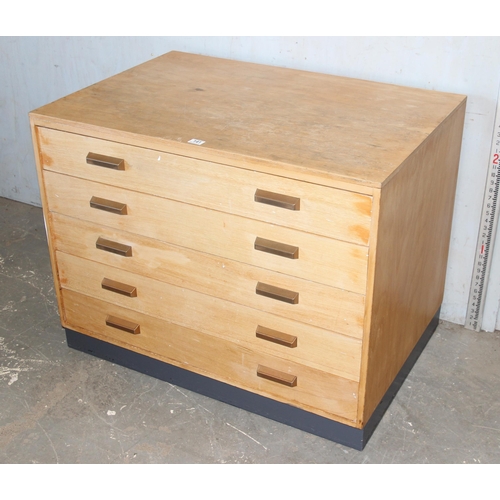 141 - Lightwood retro 5 draw plan chest with interesting graffiti to the back, approx 101cm wide