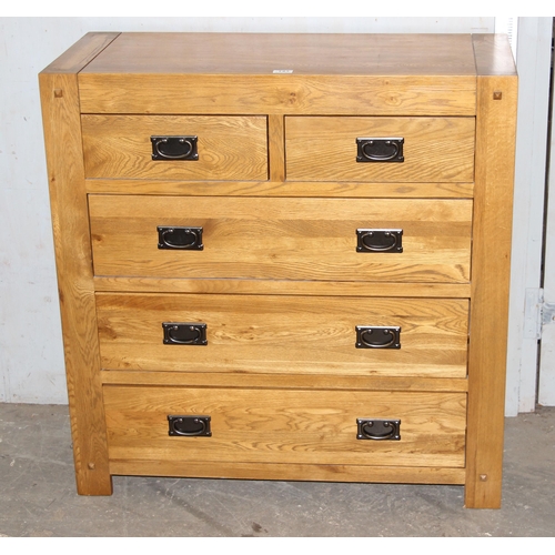 143 - Modern solid oak 2 over 3 chest of draws