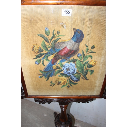 155 - A 19th century Rosewood fire screen with beadwork panel depicting an exotic bird, the frame with sup... 