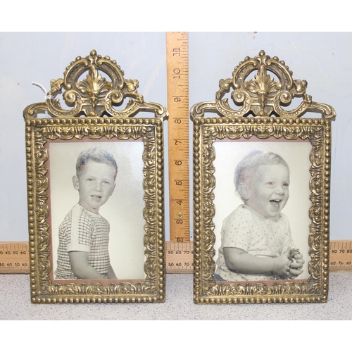 410 - A pair of vintage decorative brass picture frames