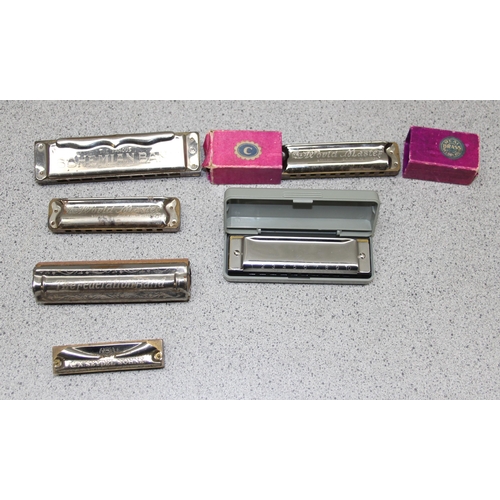 655 - 6 vintage harmonicas to include 'The band master' & 'The famous Bohemian band'