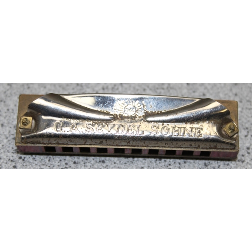 655 - 6 vintage harmonicas to include 'The band master' & 'The famous Bohemian band'