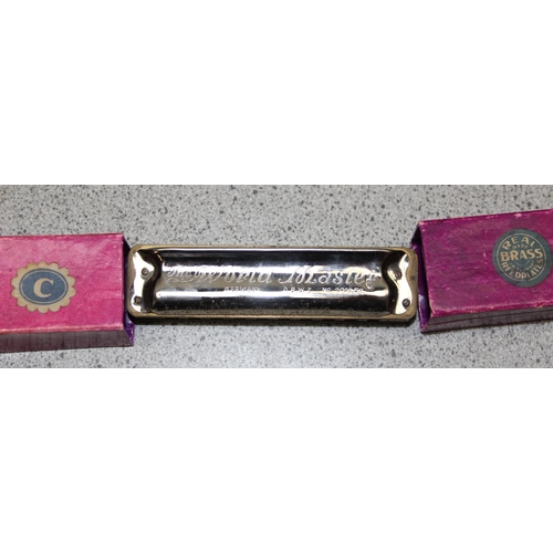 655 - 6 vintage harmonicas to include 'The band master' & 'The famous Bohemian band'