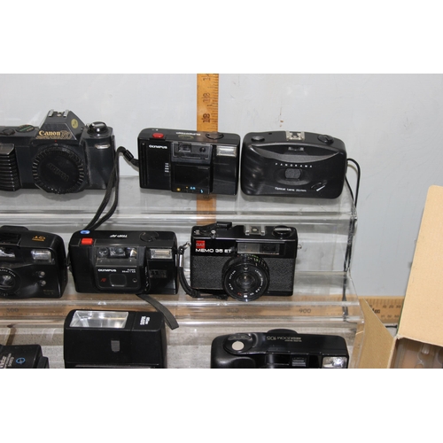 715 - Box of vintage cameras to include Olympus & Cannon