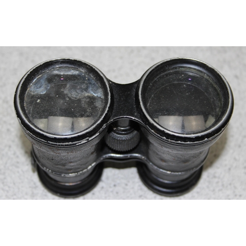 717 - 2 pairs of vintage binoculars, one by Voightlander