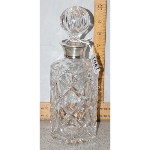 1047 - A silver topped and cut glass decanter, marks for Birmingham 1974 by JB Chatterley & Sons, approx  2... 