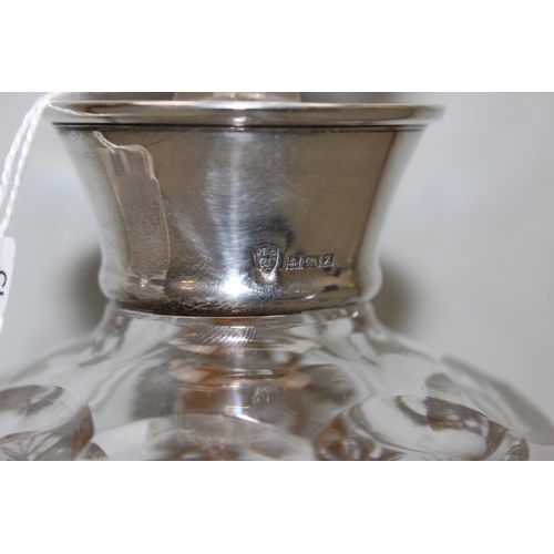 1047 - A silver topped and cut glass decanter, marks for Birmingham 1974 by JB Chatterley & Sons, approx  2... 