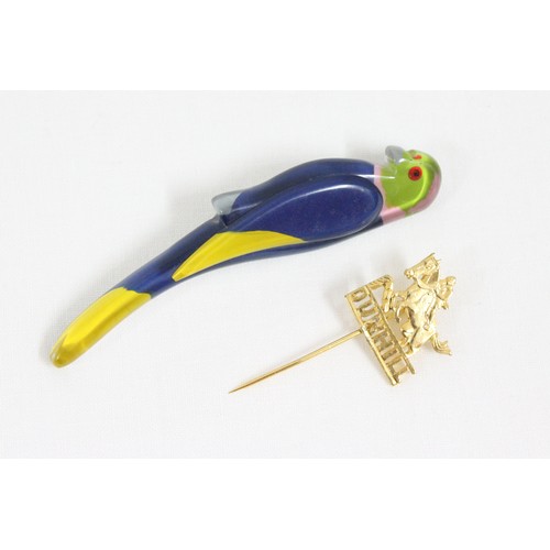 1120 - A retro plastic brooch formed as a parrot, an Art Deco period bracelet formed with Scottie Dogs and ... 