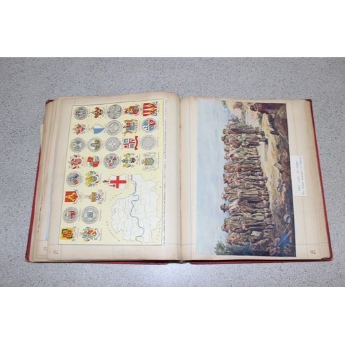 1435 - An early 20th century ledger book containing a large qty of assorted military scraps and cuttings