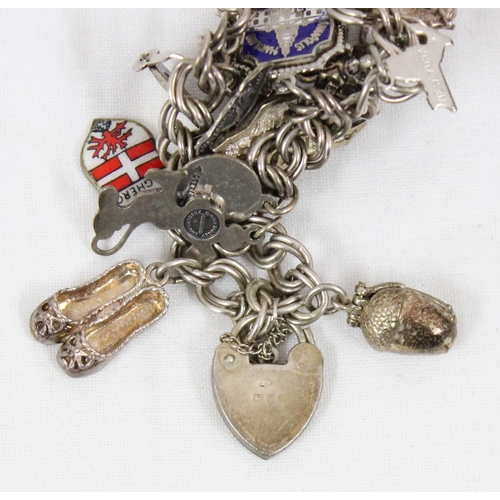 1134 - Vintage silver charm bracelet and various charms, approx 46.83g gross