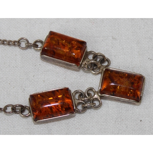 1138 - Silver and amber necklace and a pair of silver and amber earrings