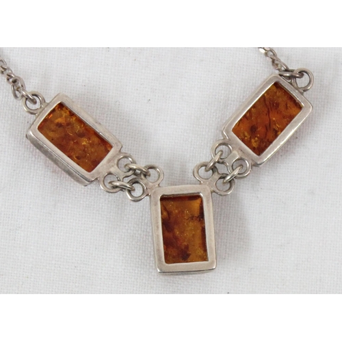 1138 - Silver and amber necklace and a pair of silver and amber earrings