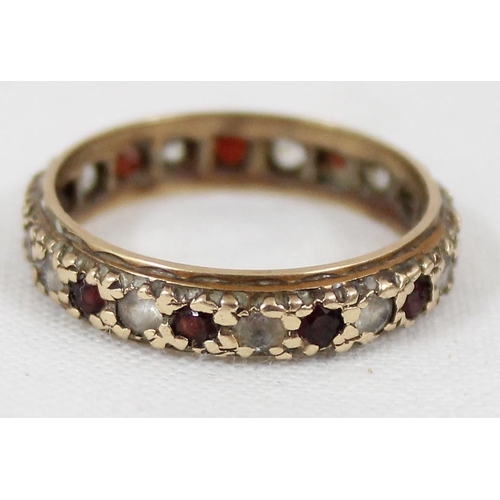 1142 - 9ct gold eternity ring set with onyx and white stone, approx size O, approx 2.41g gross, in box