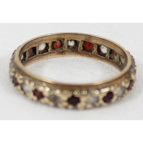 1142 - 9ct gold eternity ring set with onyx and white stone, approx size O, approx 2.41g gross, in box